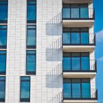 apartment architecture, against a blue sky