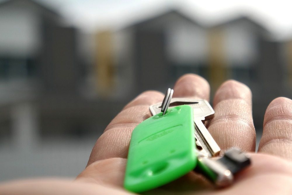 handing keys of your rental property over to a new lettings management agent