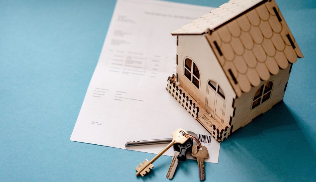 House keys and details of house sale, suggesting a house sale or house move.