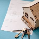 House keys and details of house sale, suggesting a house sale or house move.