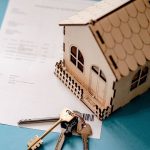 House keys and details of house sale, suggesting a house sale or house move.