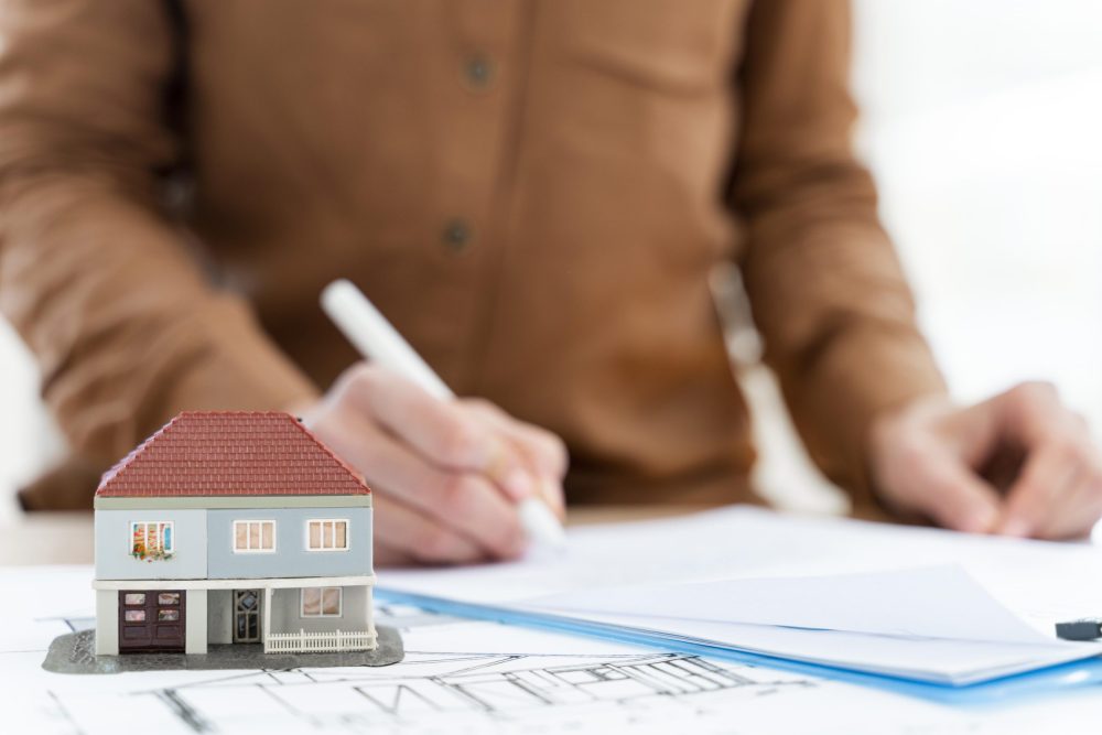 landlord-signing-contract-renters rights act aston knowles